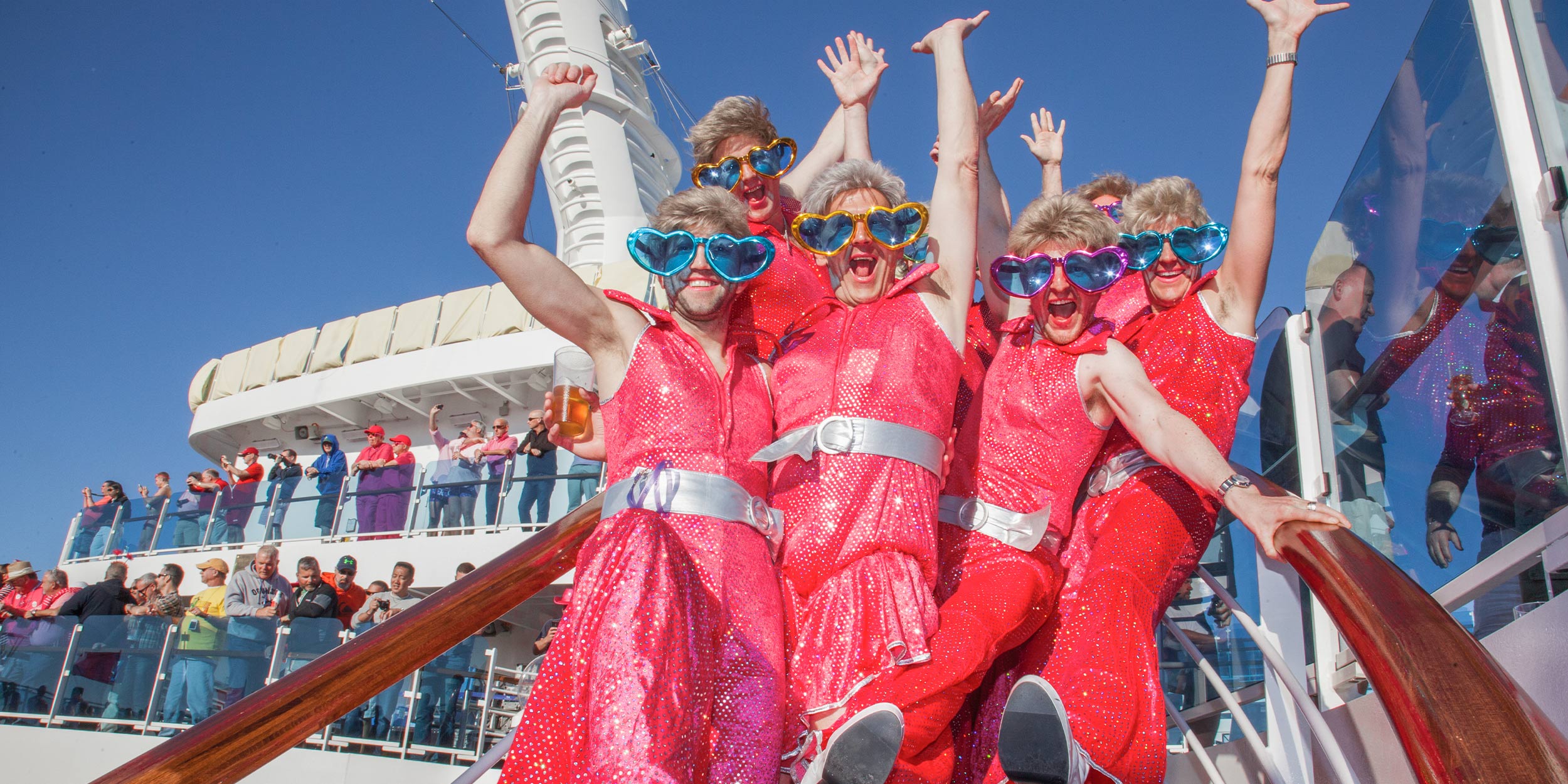 People at a party wearing pink costumes