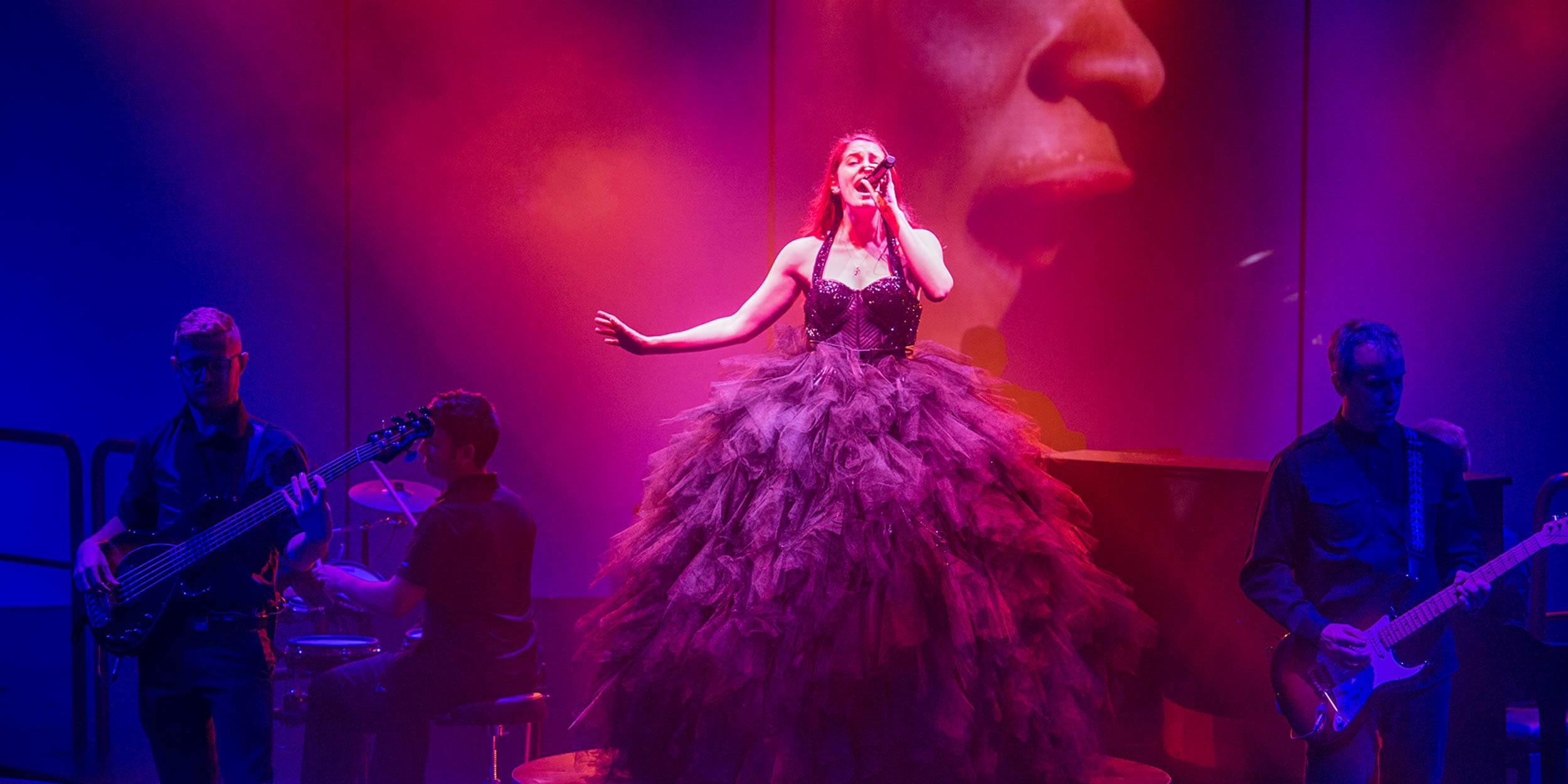 singer in red dress